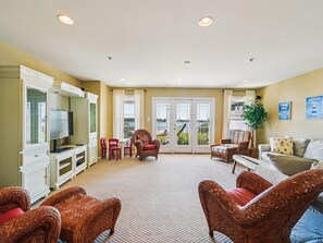 TV, fireplace, books, offices