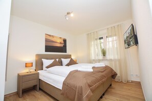 3 bedrooms, free WiFi - Watthof apartment 11<br>Modern apartment in a quiet location with access to the sea (Stinteck)