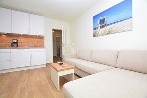 TV - Watthof apartment 13<br>Cozy apartment with terrace and access to the sea time (Stinteck)