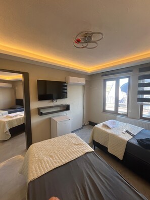 Habitación clásica | Ropa de cama de alta calidad, wifi gratis, ropa de cama