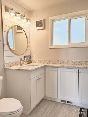 Shower, eco-friendly toiletries, hair dryer, towels