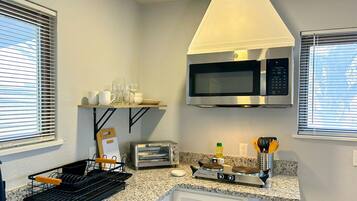 Fridge, microwave, coffee/tea maker, toaster