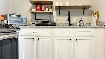 Fridge, microwave, stovetop, coffee/tea maker