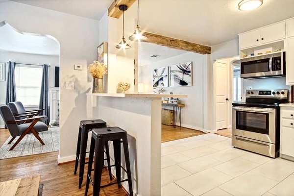 Spacious and comfortable, the living area is perfect for cozy nights in or lively conversations.