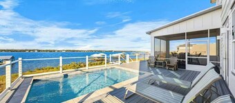 Waterfront Views - Walk to Beach - Heated Pool