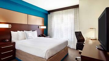 Desk, laptop workspace, blackout drapes, iron/ironing board