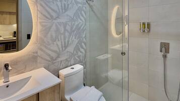 Standard Studio | Bathroom | Shower, hair dryer, towels, soap