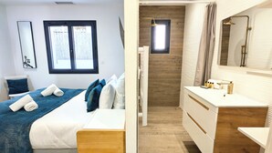 Een slaapkamer met een bed, kussens en een nachtkastje.