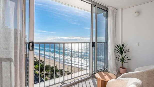 A balcony with a view of the beach and ocean. - Boho Oceanview Getaway (Gold Coast)