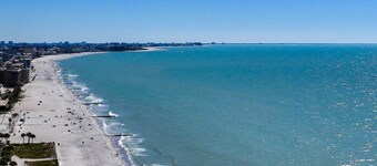 Luxury 4-Story Townhome with Heated Pool, Private Elevator, Rooftop Deck & Steps to Madeira Beach