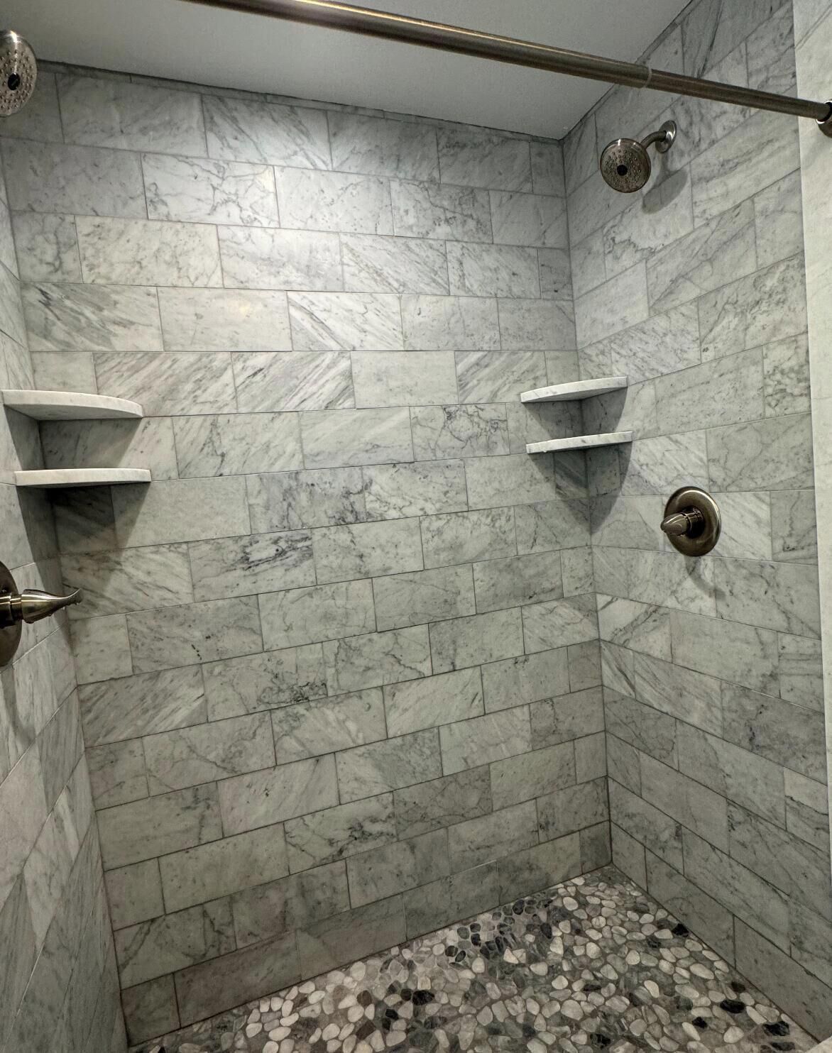 Shower, hair dryer, towels, shampoo