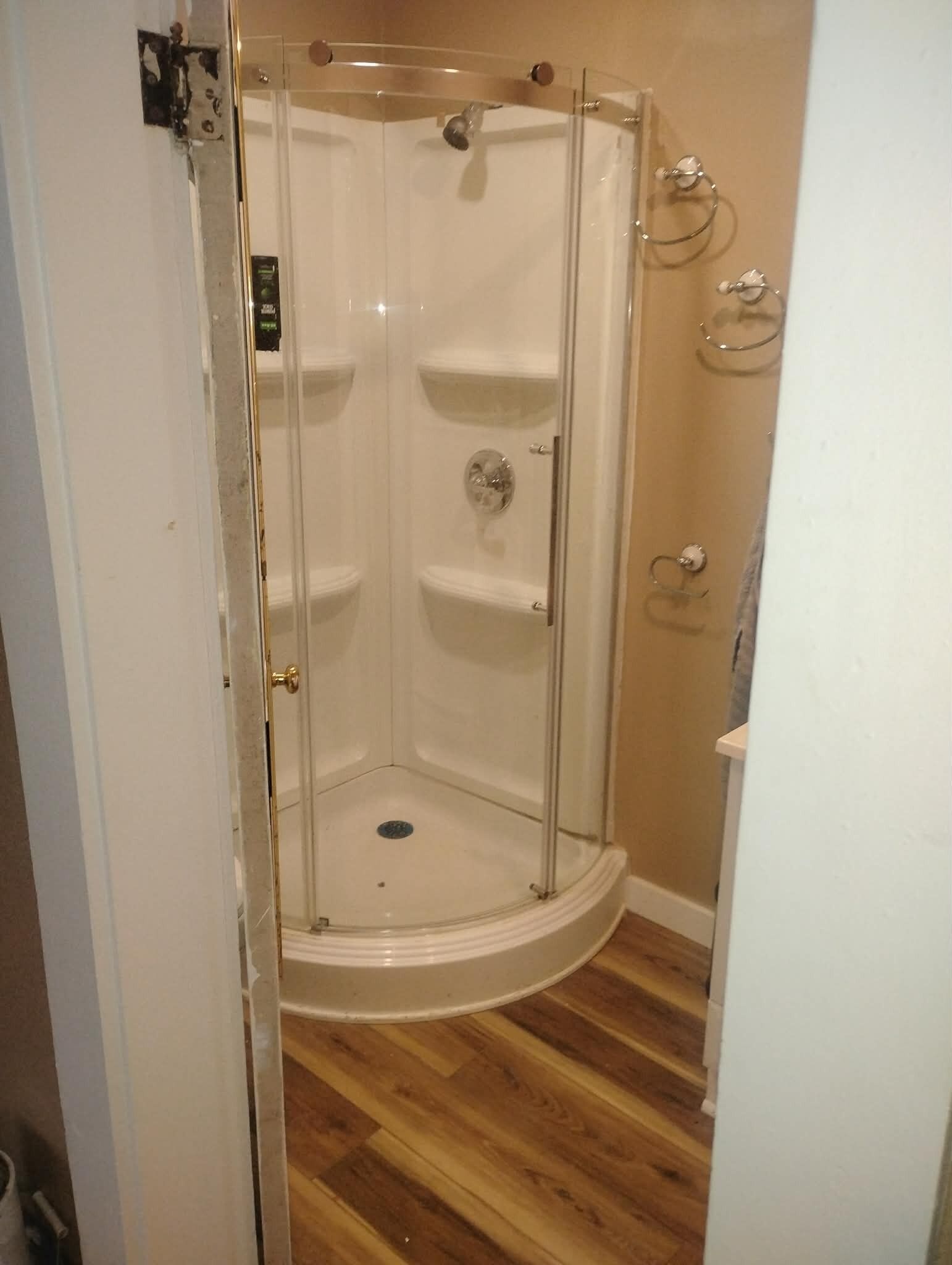 Shower, towels, soap, toilet paper