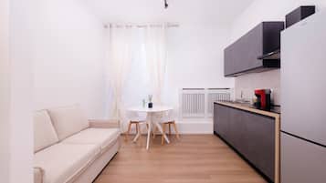 Deluxe-Apartment, Stadtblick | Wohnbereich