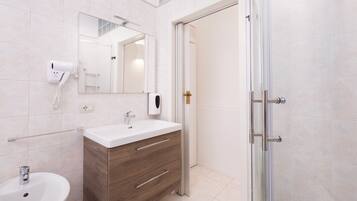 Deluxe Double Room, City View | Bathroom | Shower, free toiletries, hair dryer, towels