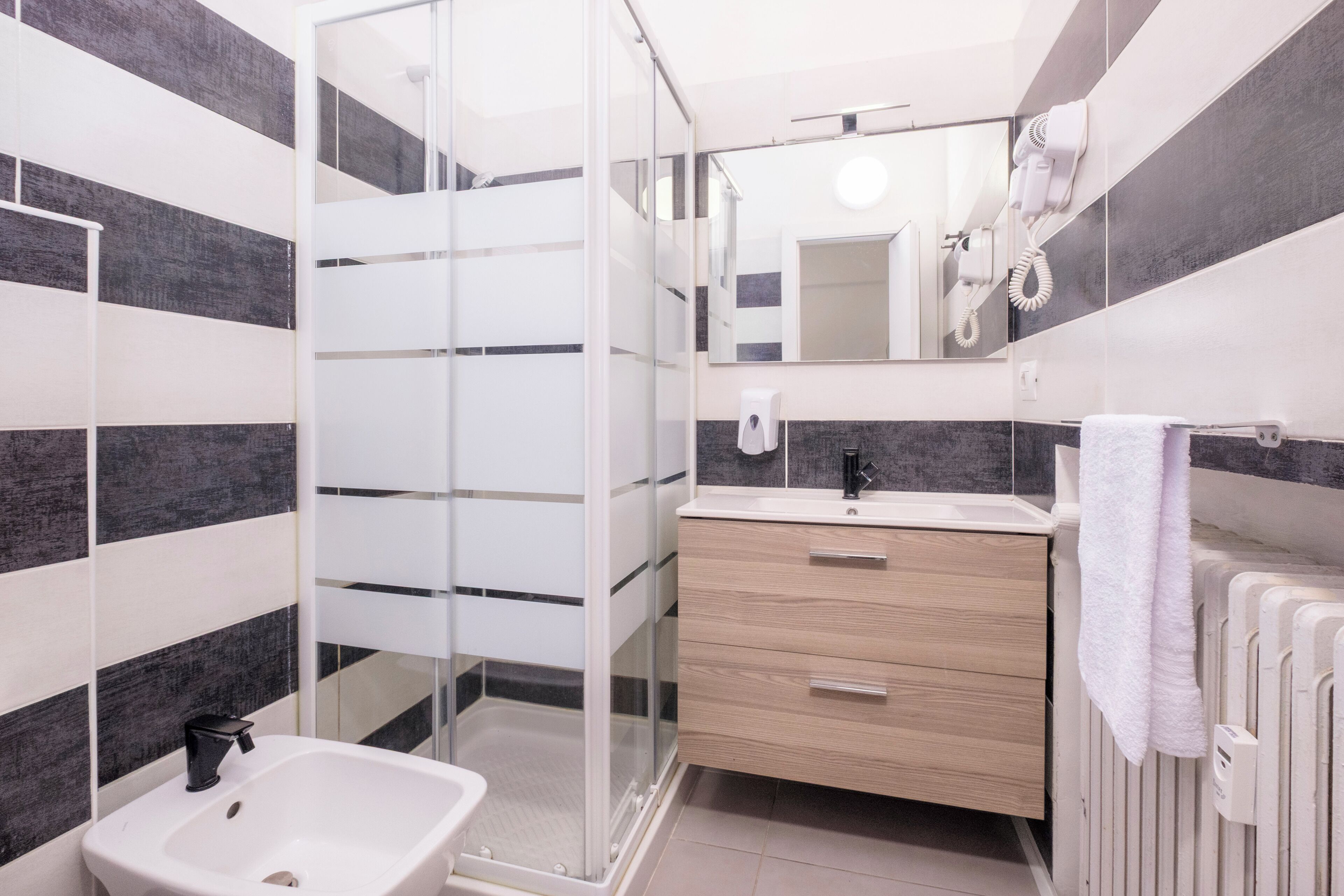 Shower, free toiletries, hair dryer, towels