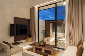 Deluxe Villa, 2 Bedrooms, Private Bathroom, Pool View | Living area | 32-inch Smart TV with digital channels