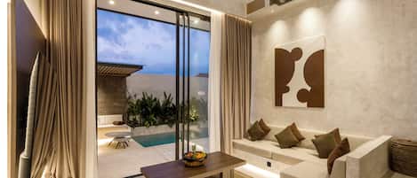 Deluxe Villa, 2 Bedrooms, Private Bathroom, Pool View | Living area | 32-inch Smart TV with digital channels