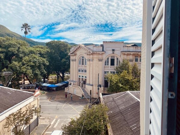 A building with a classical architectural style, featuring arched windows and a central entrance. - Thermas da Mantiqueira Poços de Caldas (Poços de Caldas)