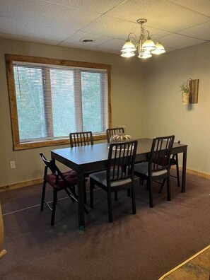 Dining - Ski getaway with hill view and hot tub- Lower unit (Iron River)