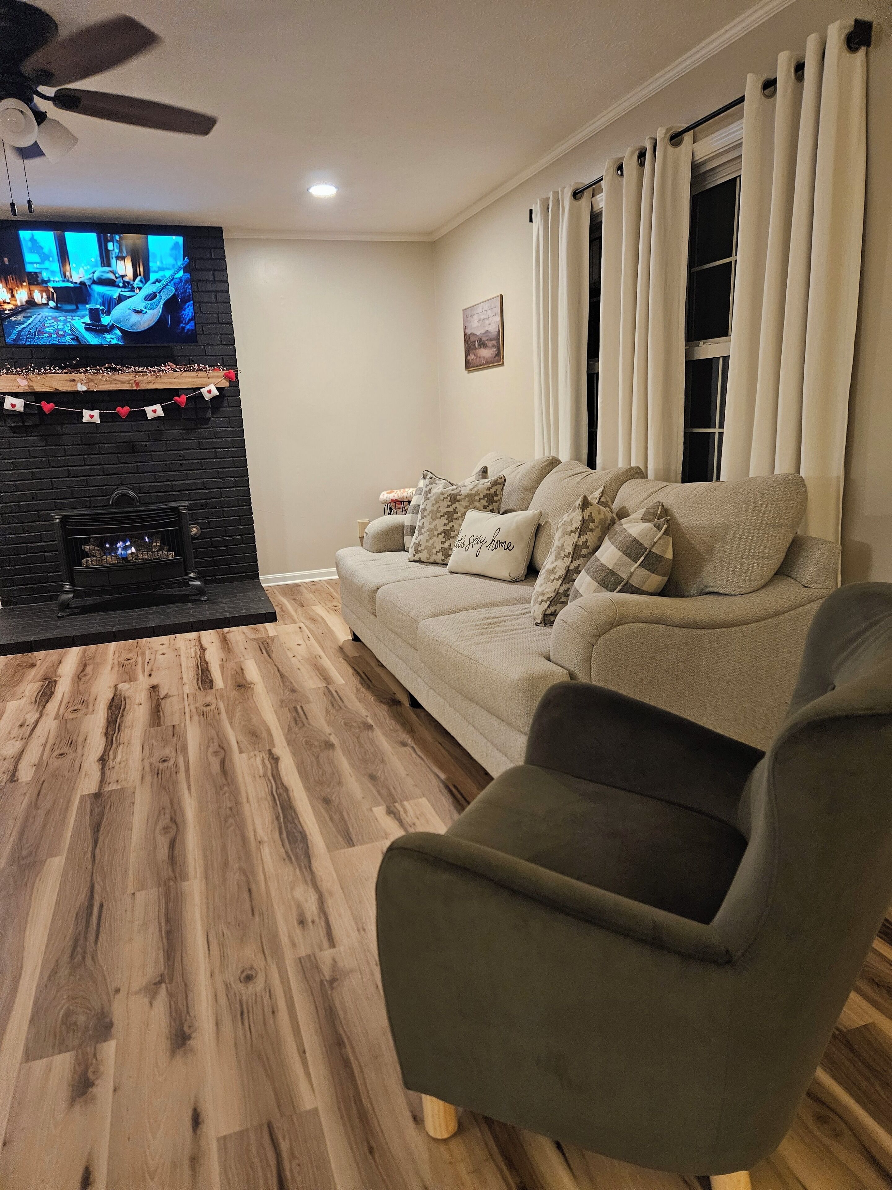 Smart TV, fireplace, books