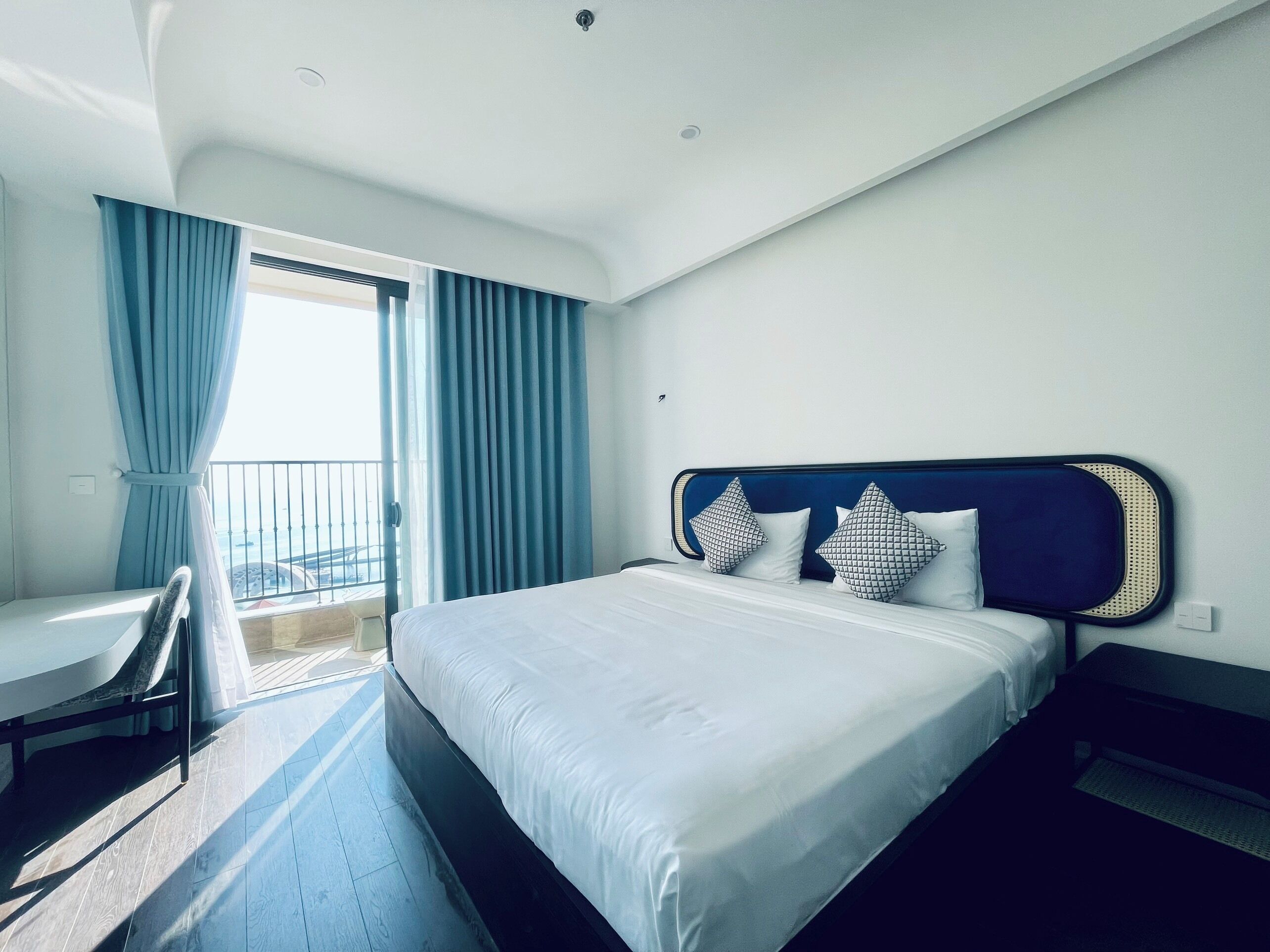 Desk, blackout curtains, soundproofing, iron/ironing board