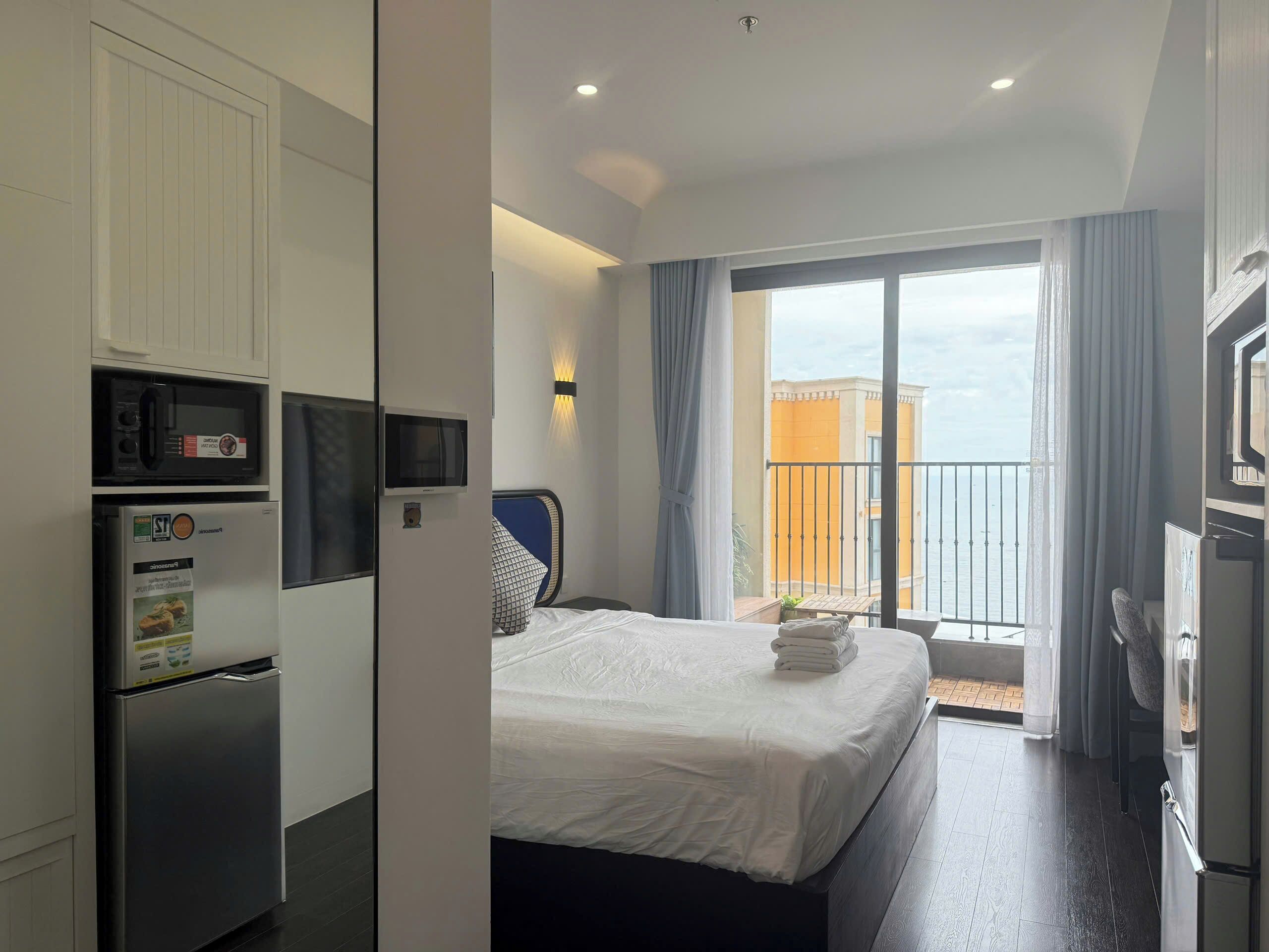 Desk, blackout curtains, soundproofing, iron/ironing board