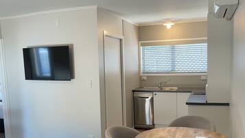 One Bedroom Apartment | Private kitchenette | Mini-fridge, microwave, stovetop, dishwasher