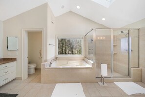 Shower, jetted bath, towels