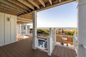 Terrace/patio - Villa Kai | Oceanfront Luxury w/ Pool, Fire Pit, Elevator, Cabana & $250 Beach Gear Credit (Holden Beach)