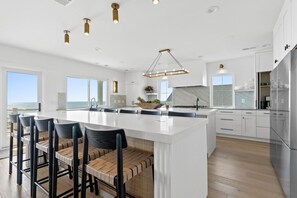 Fridge, microwave, oven, stovetop - Villa Kai | Oceanfront Luxury w/ Pool, Fire Pit, Elevator, Cabana & $250 Beach Gear Credit (Holden Beach)