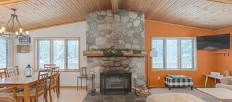 Ski getaway with hill view and hot tub- Upper Unit