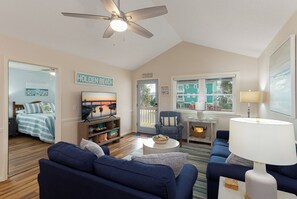 TV - Relax at Blue Crab Shack, a spacious dog-friendly home with marsh views in Holden Beach. (Holden Beach)