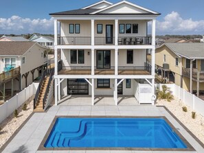 A heated pool - Sunset Skies: Stylish 4BR beach home in Holden Beach with a private pool. (Holden Beach)