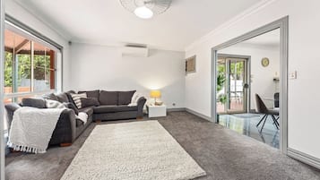 Spacious, comfortable lounge designed for slowing down. A relaxed space that works just as well for quiet afternoons as easy family evenings.