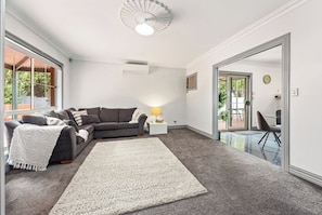 Spacious, comfortable lounge designed for slowing down. A relaxed space that works just as well for quiet afternoons as easy family evenings.