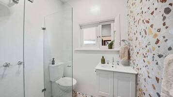 Hair dryer, towels, shampoo
