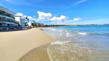 On the beach, white sand, 11 beach bars