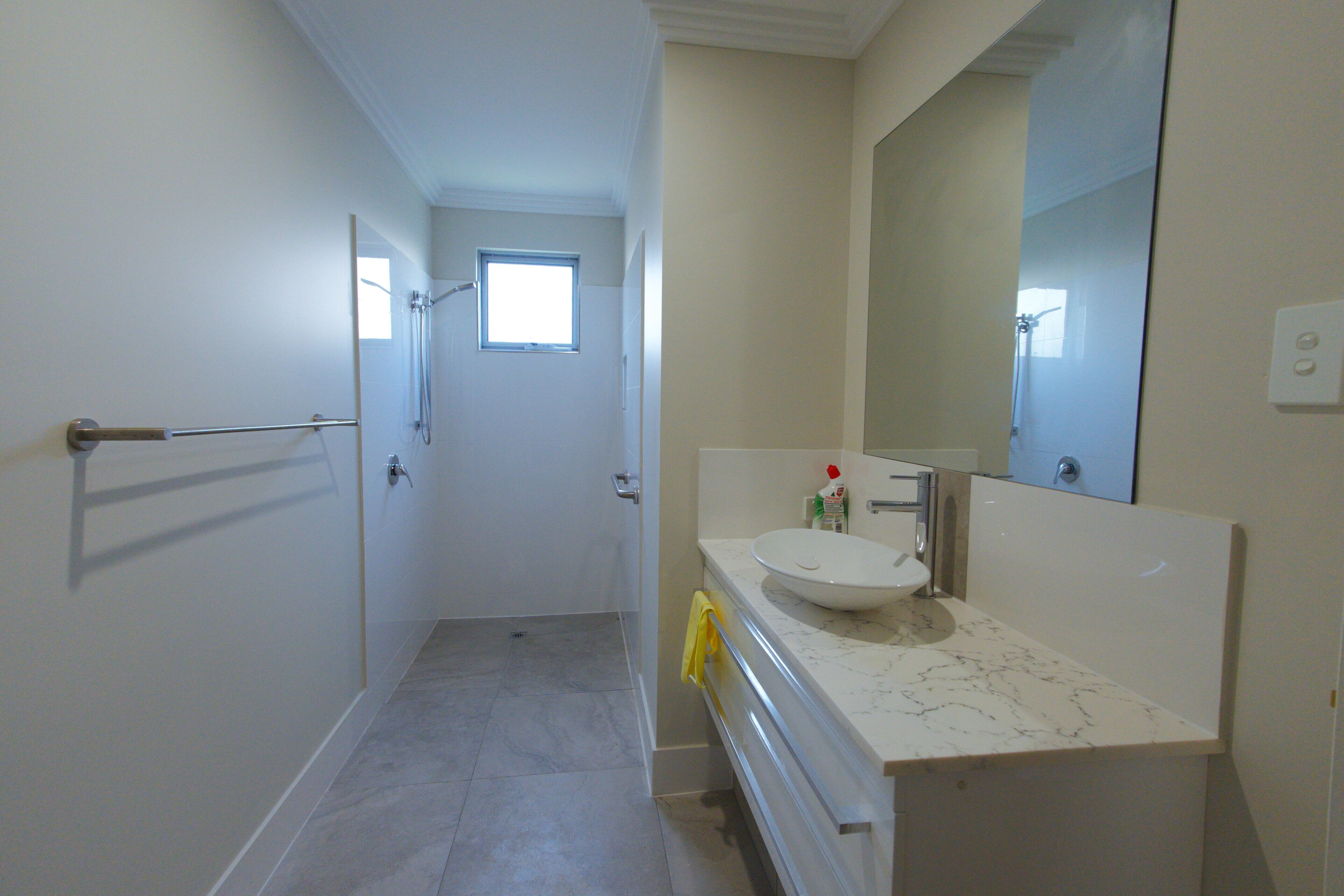 Shower, towels, soap, toilet paper