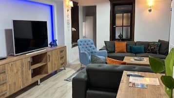 Executive-Zimmer, Mehrere Betten, Nichtraucher, Küche | Wohnbereich