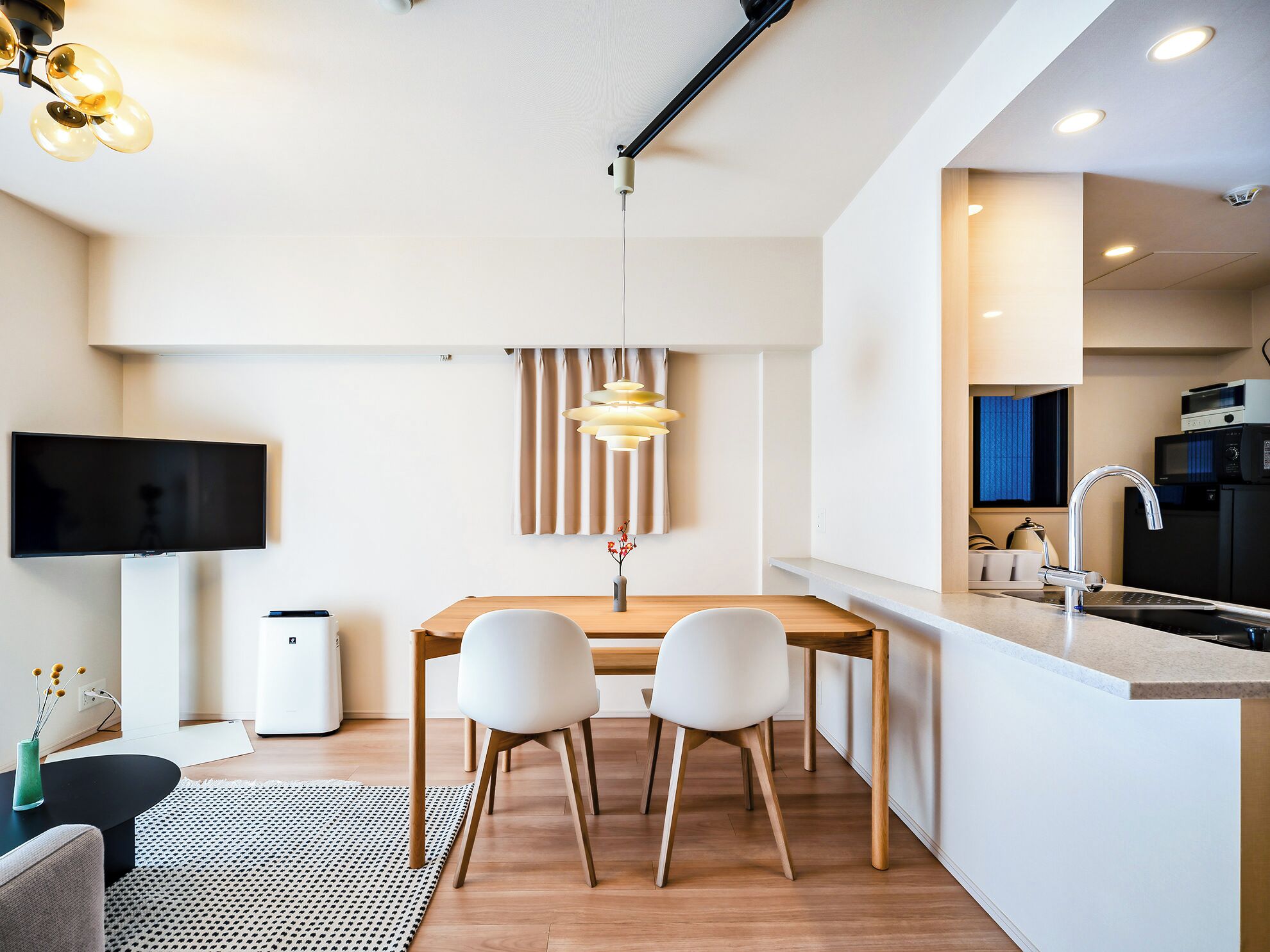 Premier Two-Bedroom Apartment | Living area | 42-inch TV with satellite channels, heated floors