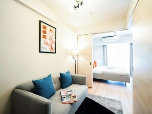 Executive Apartment | リビング エリア | テレビ、床暖房