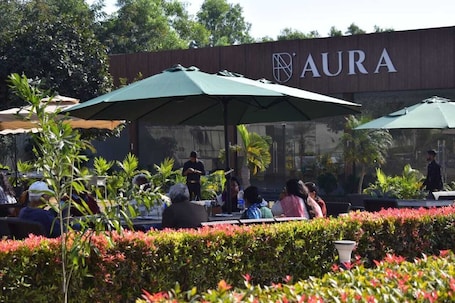 Outdoor dining. Aura Resorts