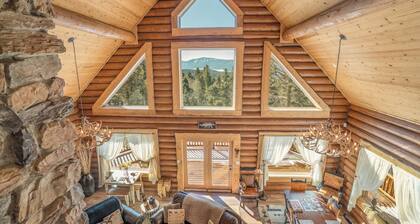 Custom high-end 3 bedroom log cabin sleeps 12. Located on the ski hill!