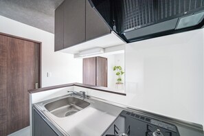 Apartment | Private kitchen | Fridge, microwave, stovetop, rice cooker