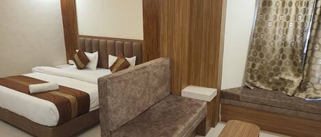 Laptop workspace, blackout curtains, soundproofing, iron/ironing board