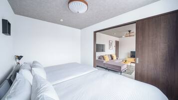 Apartamento | Tabla de planchar con plancha, wifi gratis, ropa de cama