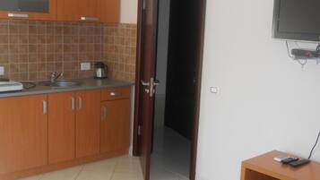 Apartment (One bedroom apartment) | Private kitchen | Fridge