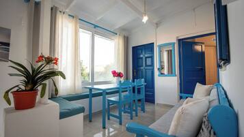 Superior-Apartment, Gartenblick, am Strand | Wohnbereich