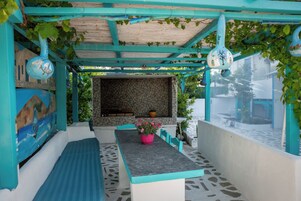 Superior Apartment, Garden View, Beachside | Outdoor dining