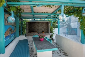 Apartamento superior, vista para o jardim, ao lado da praia | Opções para refeição ao ar livre